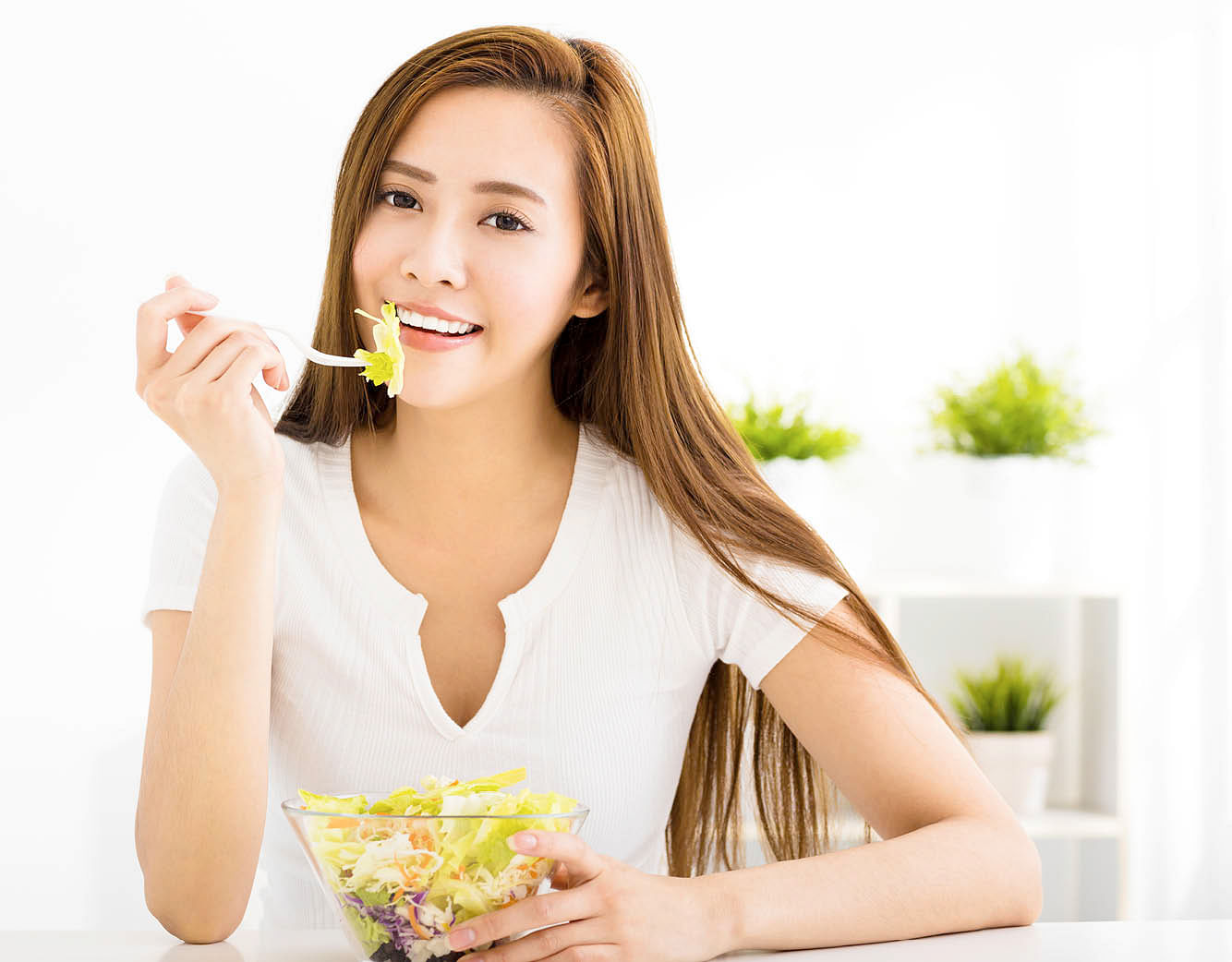 Asian girl posing with food