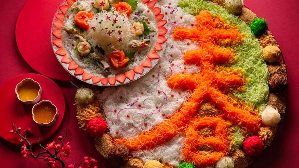For diners who want a hands-off experience, staff at Man Fu Yuan at the Intercontinental Singapore can toss the yusheng, plate it and then serve