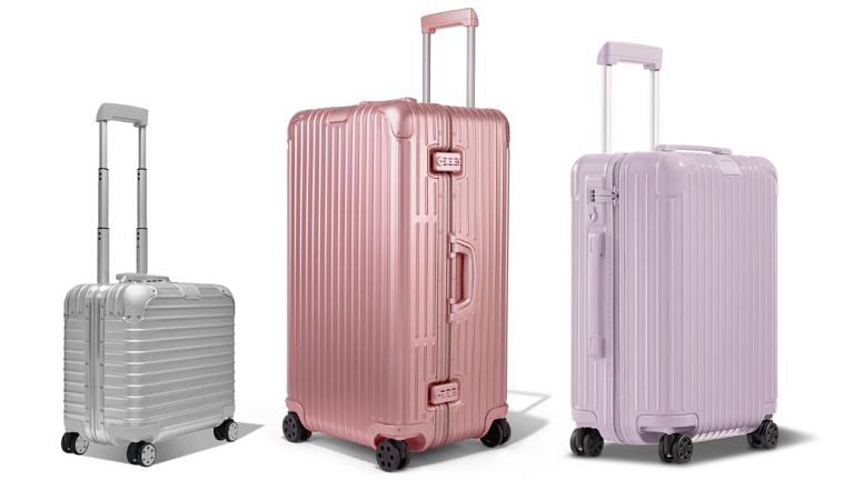 calpak luggage pink and white