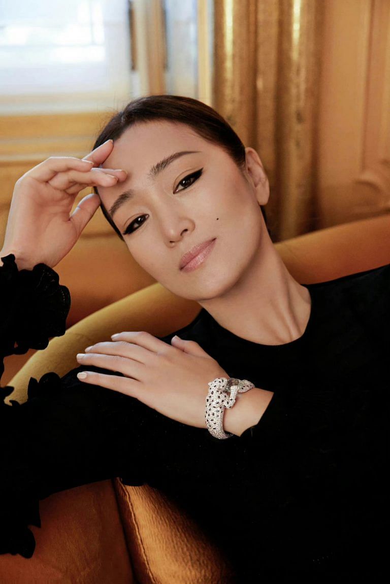 Chinese actress Gong Li poses during the Louis Vuitton 'Voyages