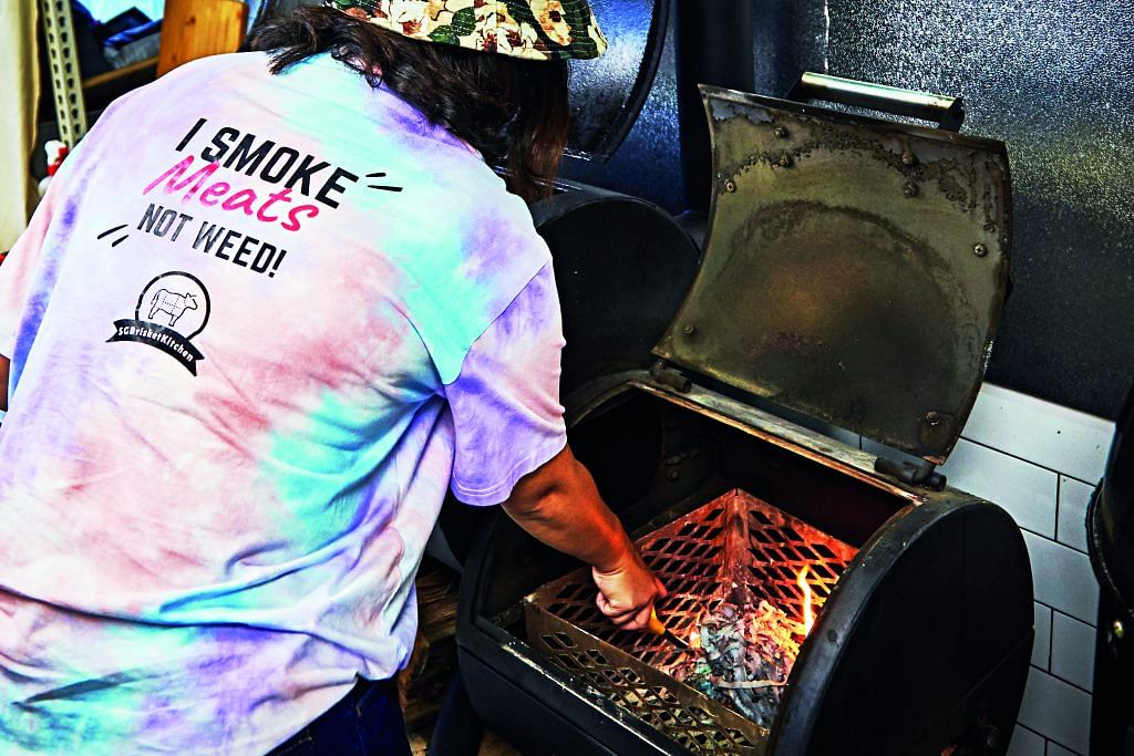 Jayce Ho smokes her meat using post-oak and sweet hickory wood.