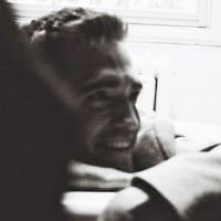 Robert Pattinson lounges for Dior Homme