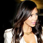 Kim Kardashian loves sparkle "overdose" for New Year parties