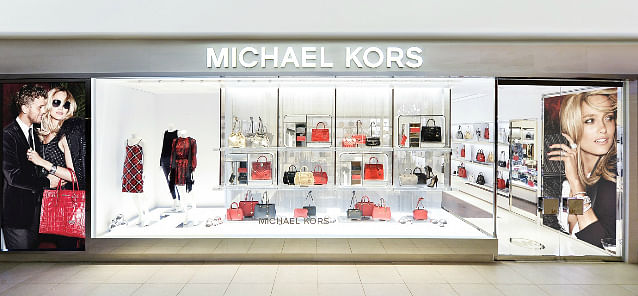 We love the cool hues of this new Michael Kors store! - Her World Singapore