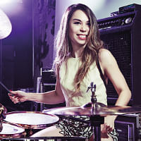 This Singapore woman quit her banking job to become a drummer
